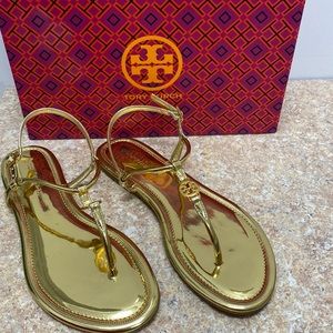New in Box Tory Burch Emmy Flat Sandal in gold metallic.